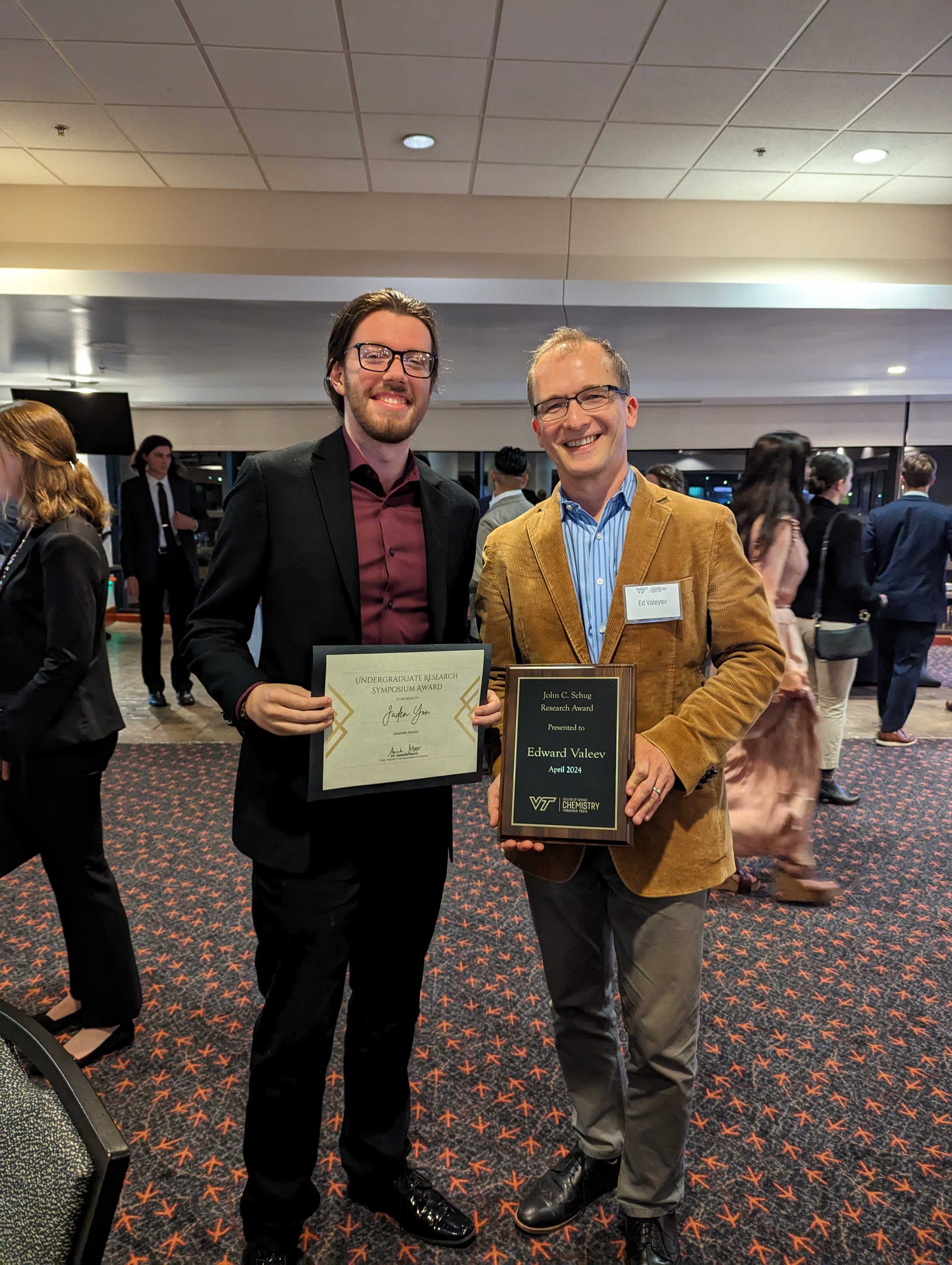 Jaden Yon and Professor Valeev with their awards